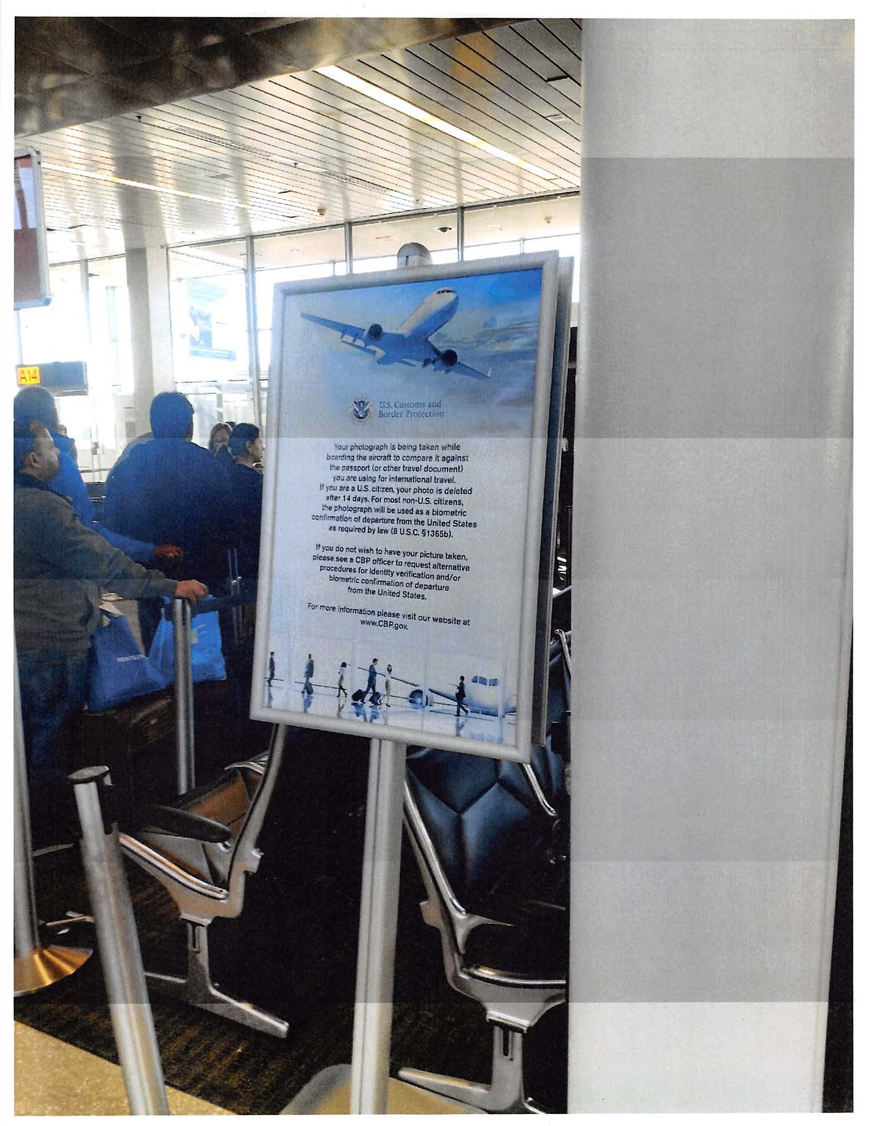 A sign in an airport explaining that there is face recognition being used in the area. This is an example of signage CBP gave us as a response to our letter.