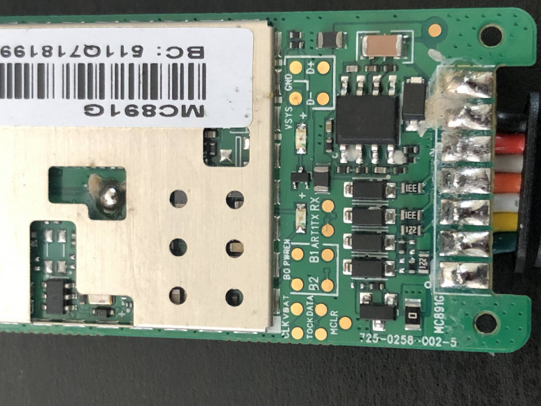 A close up of the Apollo GPS tracker circuit board hilighting the UART connections.